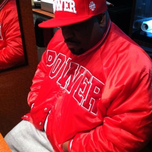 CeeLo Green wearing Generation Hustle Power hat and jacket