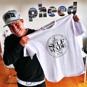 Neal Mims wearing Generation Hustle Power hat